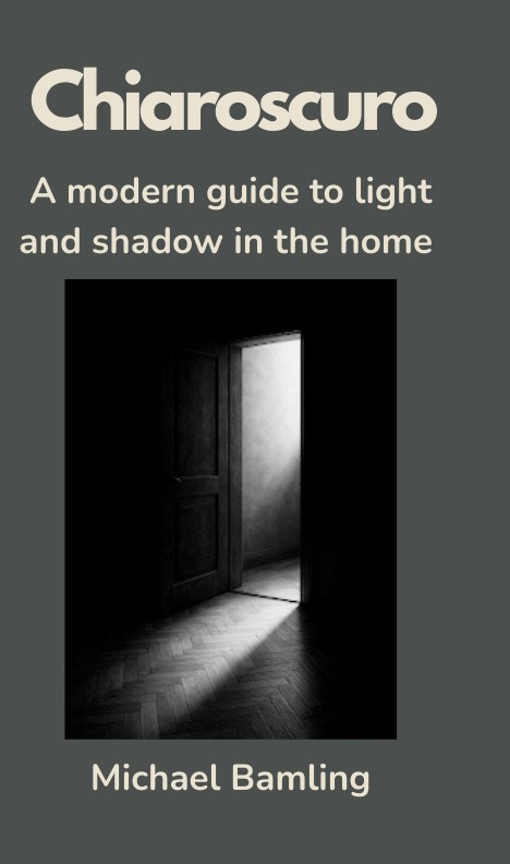 Cover of Chiaroscuro — A Modern Guide to Light and Shadow in the Home, by Michael Bamling: a dark doorway with daylight falling across a herringbone floor.
